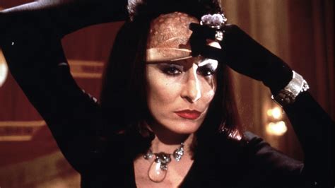 Cher taking on the role of a witch